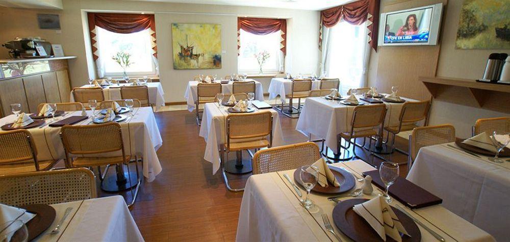 Hotel Aeroparque Inn & Suites Buenos Aires Restaurant foto